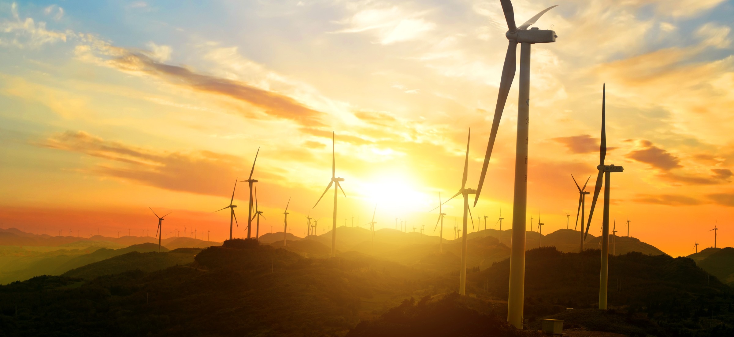 sunny landscape with windmills cropped v2